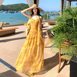 French Holiday Style Yellow Dizzling Fluttering With V-Neck Sling Dress High-End Women's Summer Show Back A Long Dress