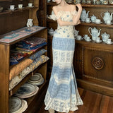 [Baby Ning] French Open Shoulder To Close The Waist Petal Crushed Flower Top + Gradually Changed Fishtail Half Skirt Woman Two-Piece Skirt