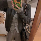 KANING Gray Fake Two-Piece Round-Neck Button Knitted Cardigan Women 2026 Autumn New Women's Korean Version Of Sweater Tide