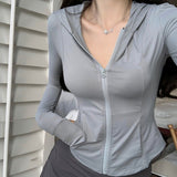 Spring And Summer Breathable Long-Sleeved Hooded Sun Jacket Repair Slim Thin Sports Top Yoga Suit Female Tide