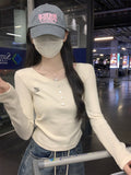 Korean Version Of Small Embroidery Shoulder Long Sleeve Bottom Shirt Women's 2026 Early Autumn Button U Neck T-Shirt Milk Blue Top