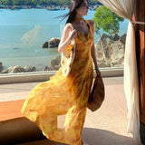 French Holiday Style Yellow Dizzling Fluttering With V-Neck Sling Dress High-End Women's Summer Show Back A Long Dress