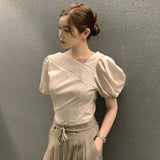 South Korea's New Summer Temperament Irregular Collar Design Sense Of Small Pressure Folding Bubble Sleeve Shirt Woman